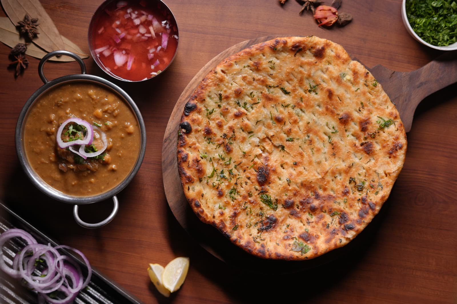 Amritsari kulcha with slow-cooked dal, onion and lemon