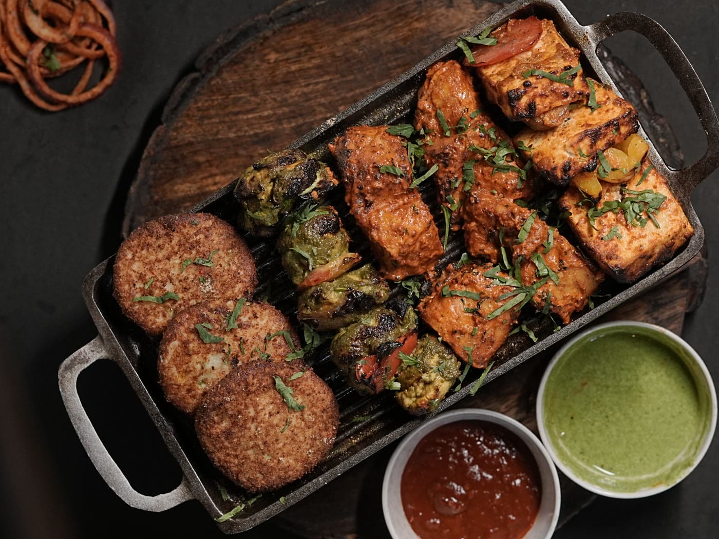 Seekh kebabs and paneer tikka with house chutneys